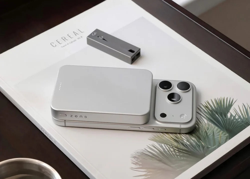 Zens MagSafe powerbank wirelessly charging a smartphone at home