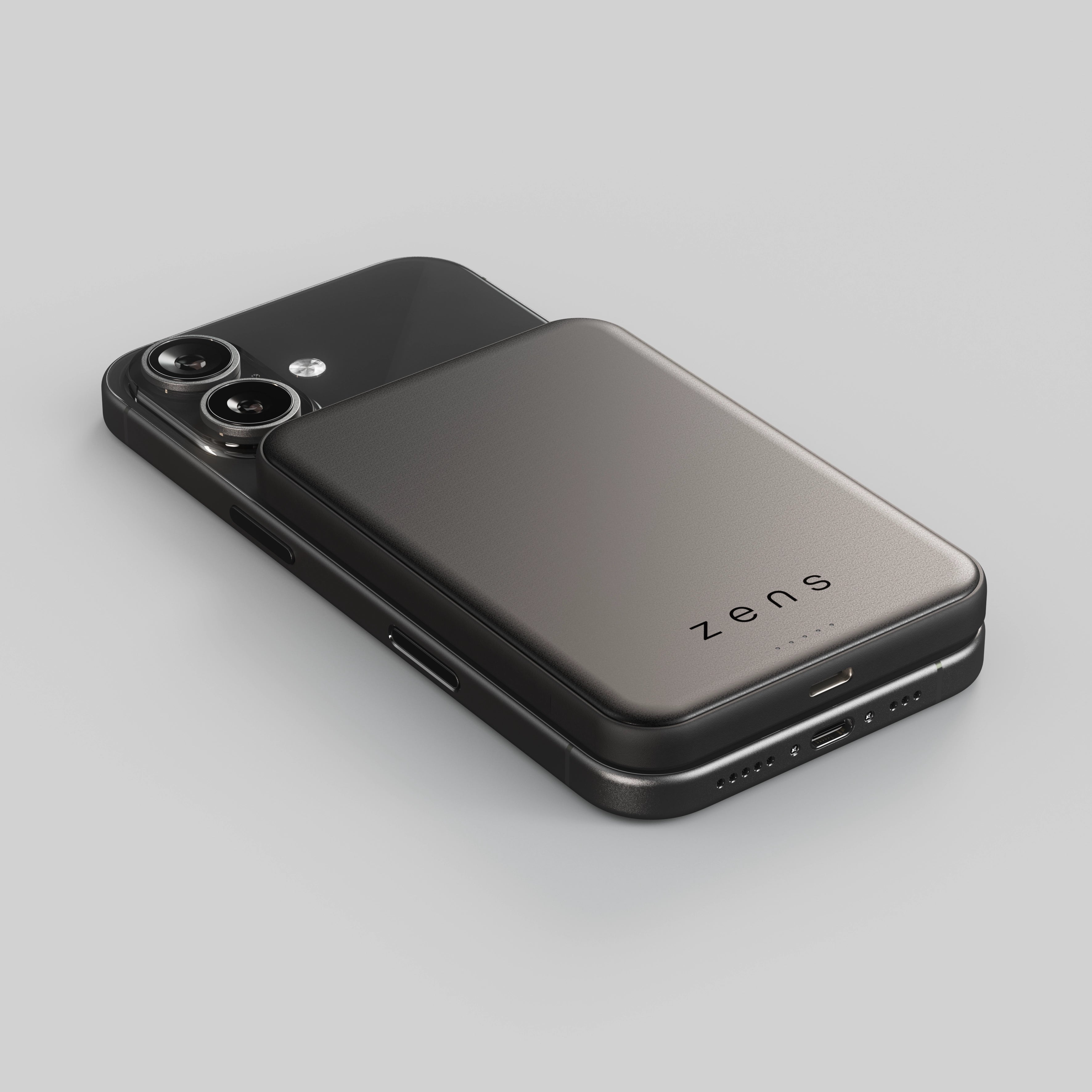Zens magnetic powerbank charging an iPhone on a white background