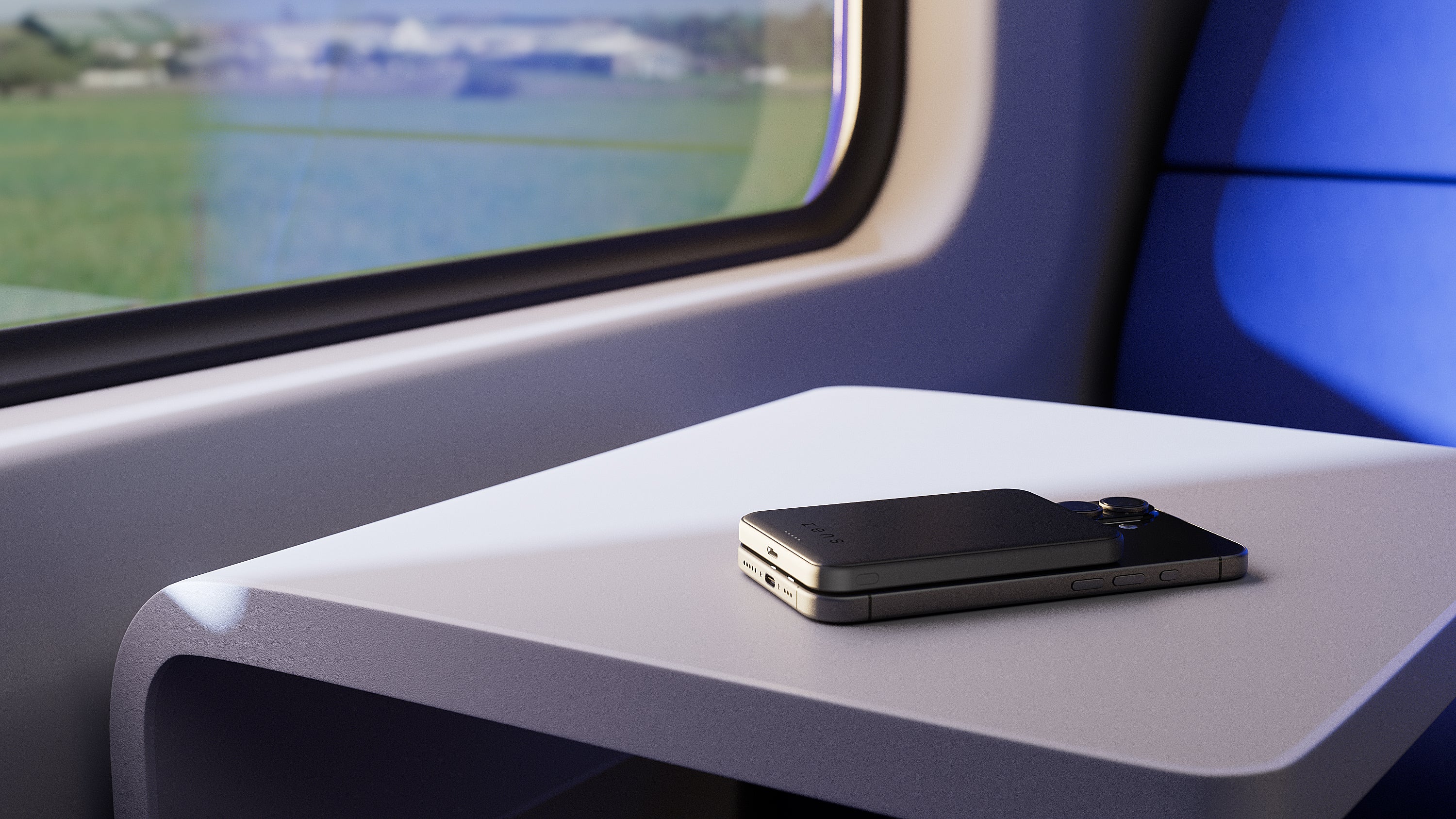 Zens semi solid state powerbank wirelessly charging an iPhone while traveling on a train