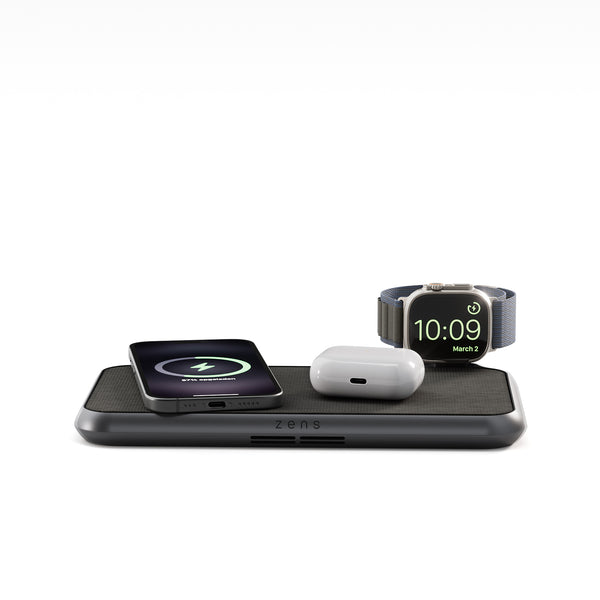 Liberty wireless charger magnetically charging a smartphone, AirPods and a watch.
