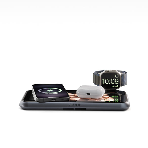 Liberty wireless charger magnetically charging a smartphone, AirPods and a watch.