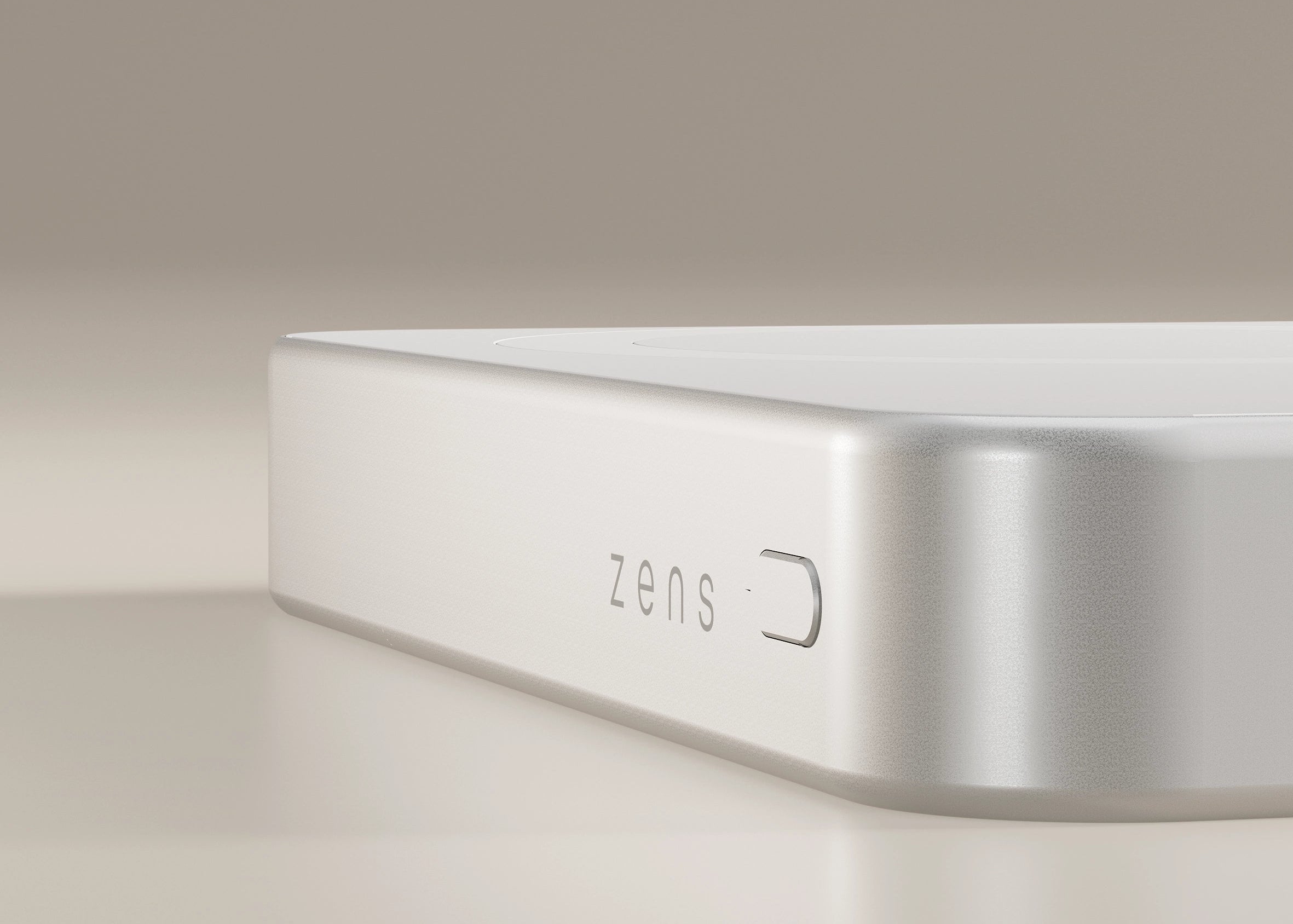 White MagSafe power bank attached to the back of a smartphone.
