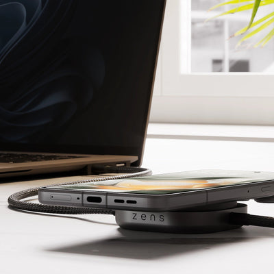USB C Pro 2 charging cable charging a laptop and a magnetic smartphone.