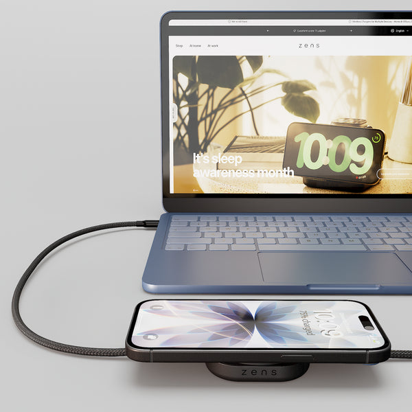 USB C to C charging cable for charging an iPhone and MacBook Pro on a desk