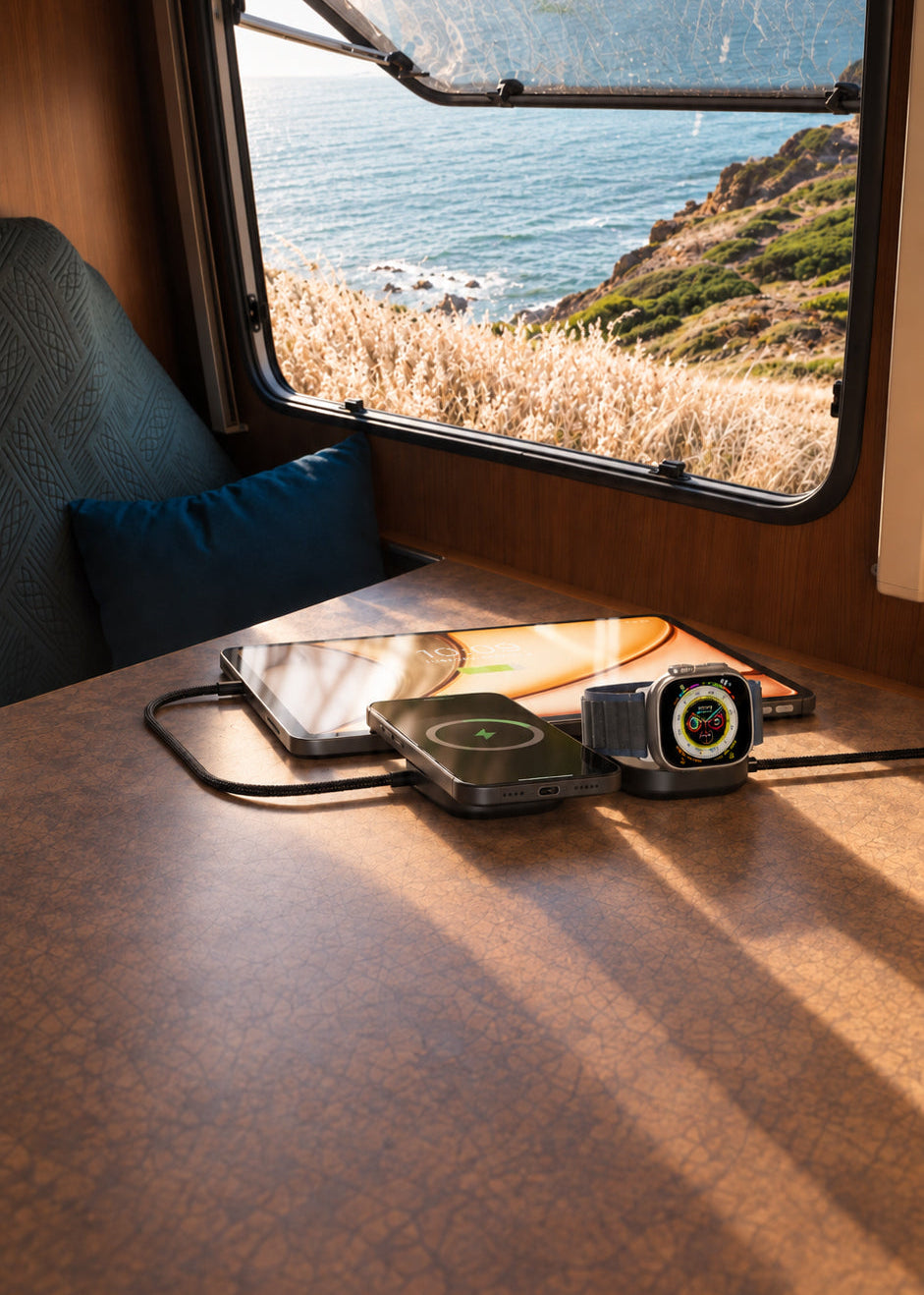 Zens Charging Cable Pro 3 with devices in a camper