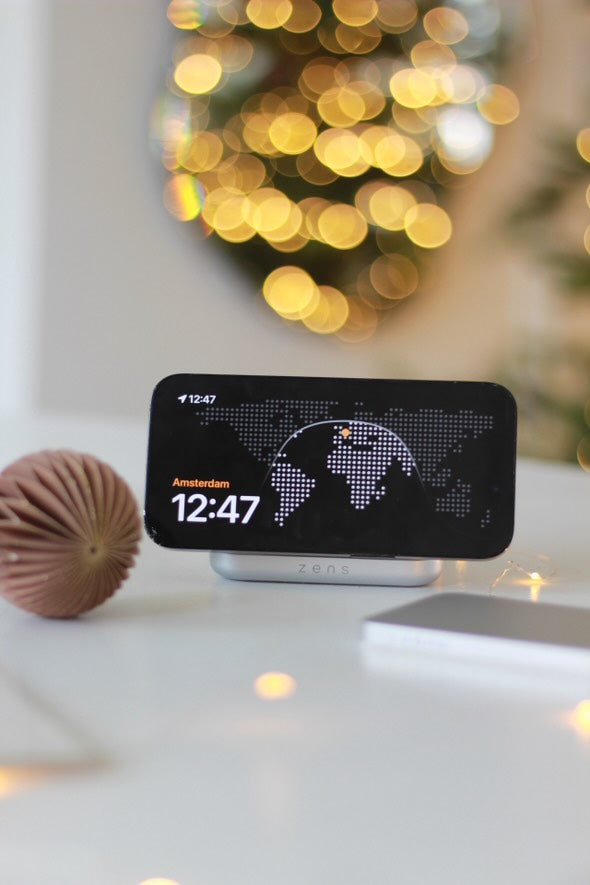 Zens Magnetic Nightstand Charger charging a smartphone alongside the Powerbank Pro 1 in a lifestyle setting with magnetic wireless charging.
