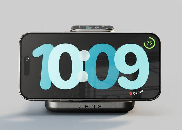 Zens Nightstand Charger Pro 2 charging an iPhone displaying a clock and an Apple Watch