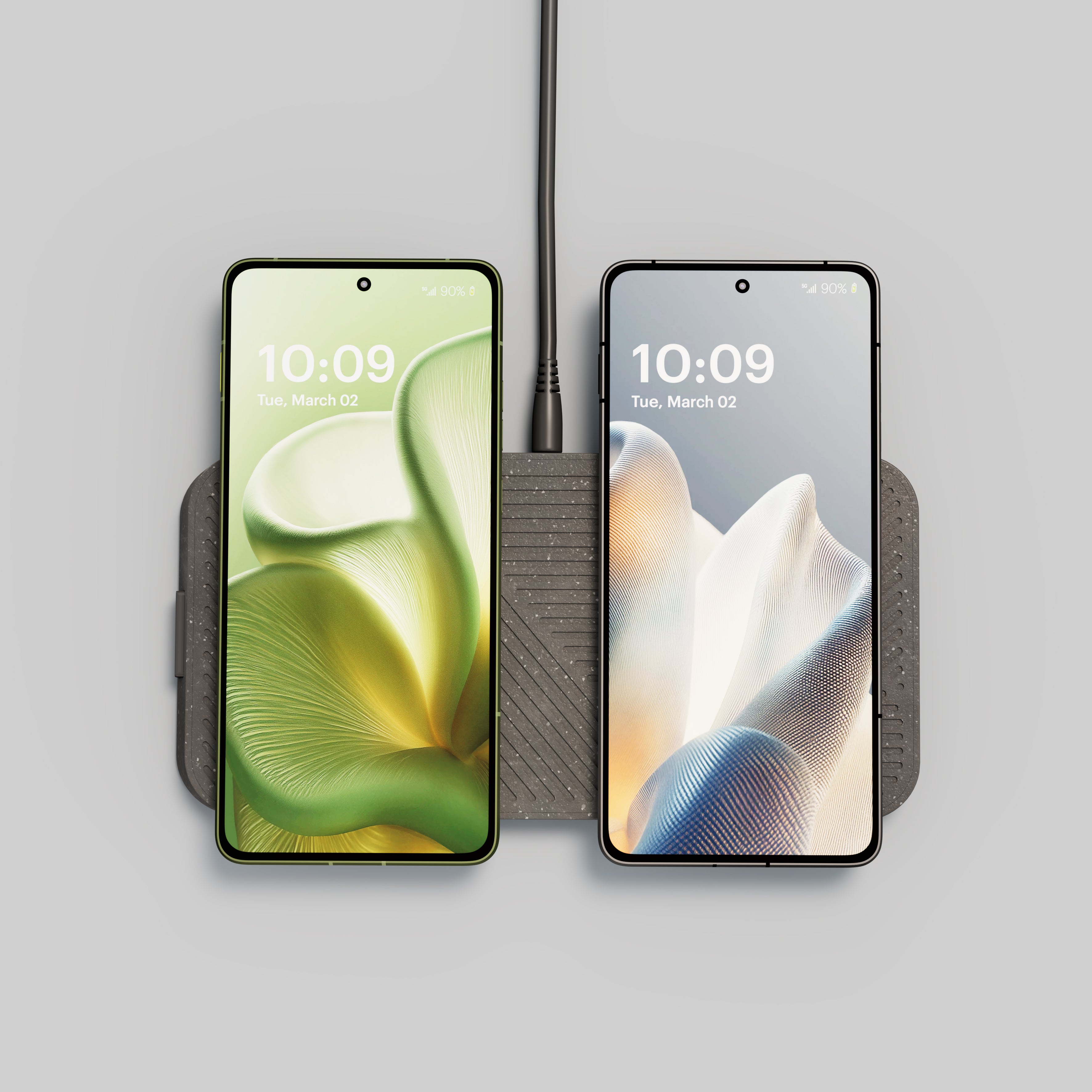 Modular Dual Wireless Charger Main Station magnetically charging two smartphones.