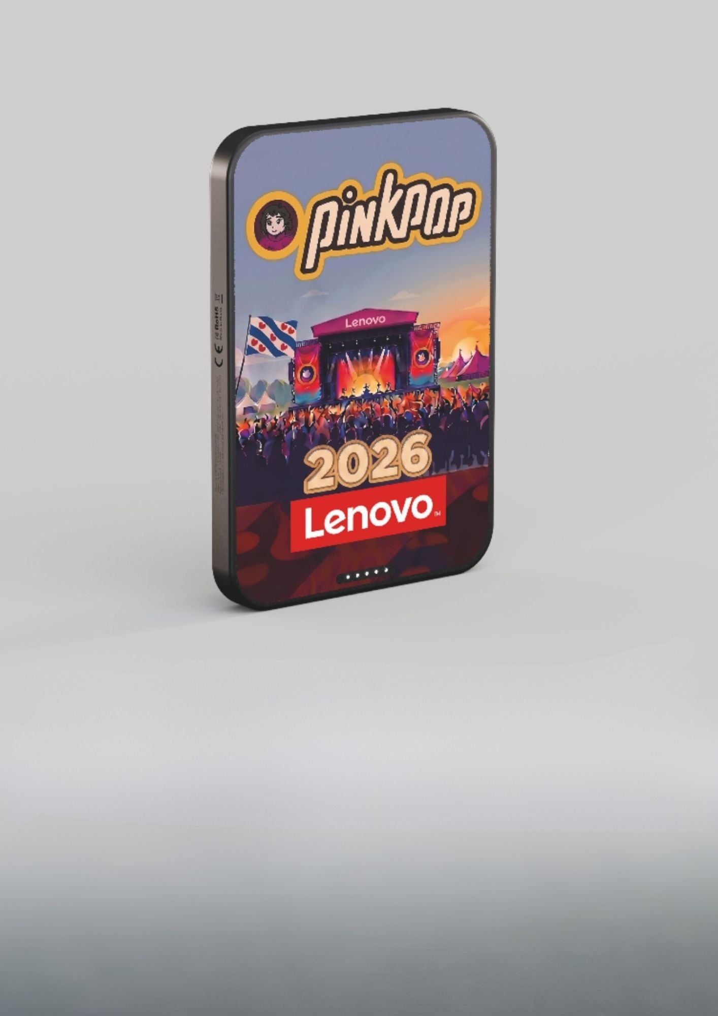 Customized Lenovo magnetic power bank attached to a smartphone at a festival.