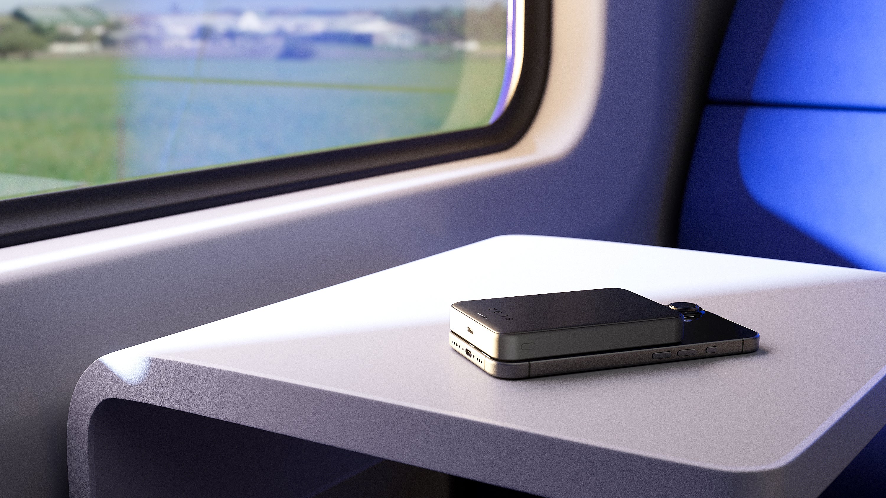 Zens semi solid state powerbank wirelessly charging an iPhone while traveling on a train