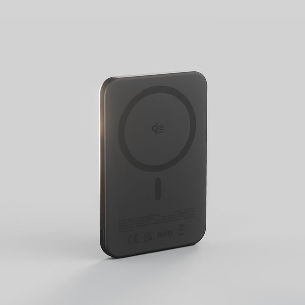 Back of black Zens magnetic wireless charger powerbank on a white background