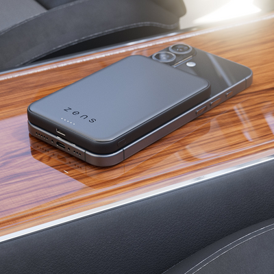 Zens magnetic wireless charger charging an iPhone in a car 