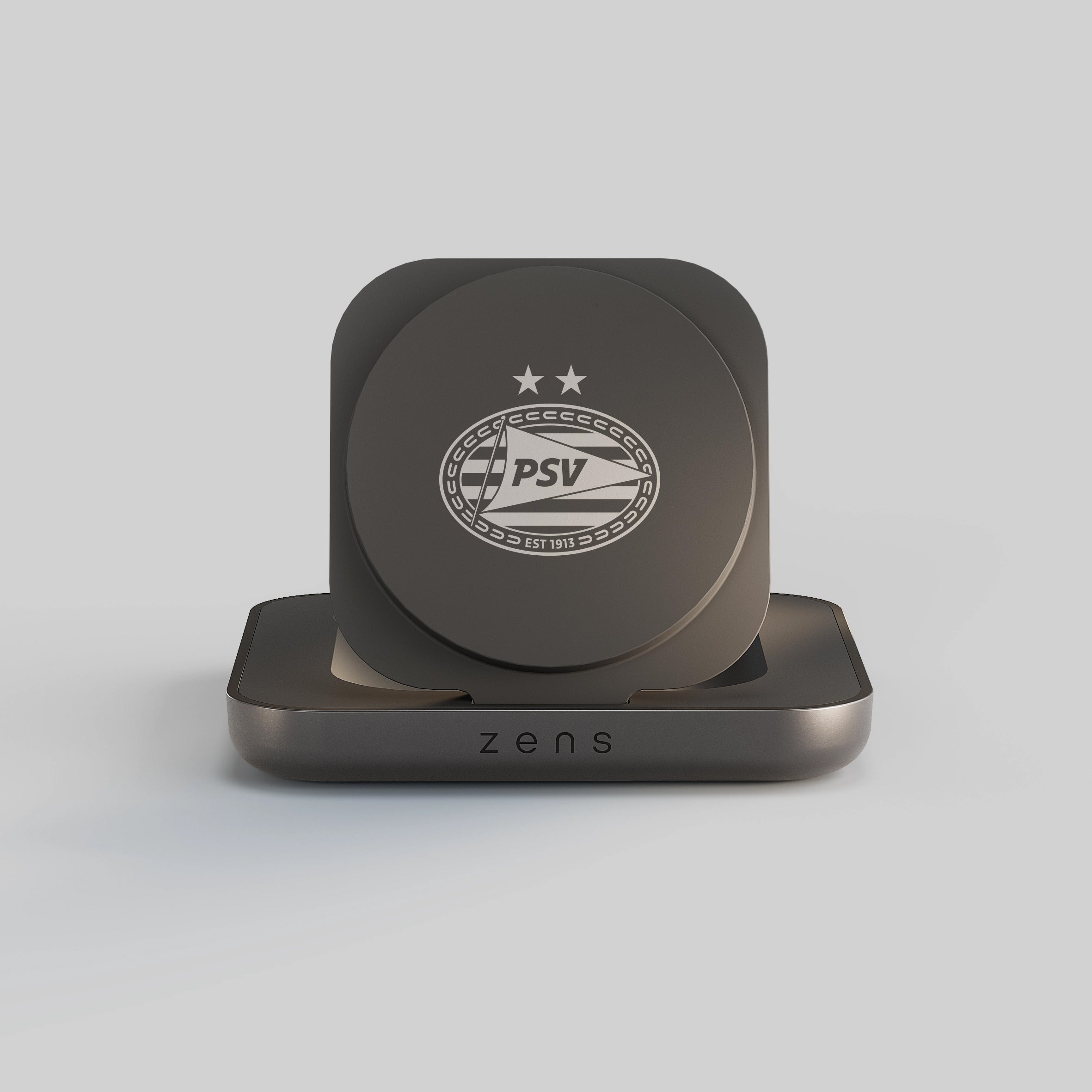 Close up of a magnetic wireless charger featuring the PSV logo on a white background
