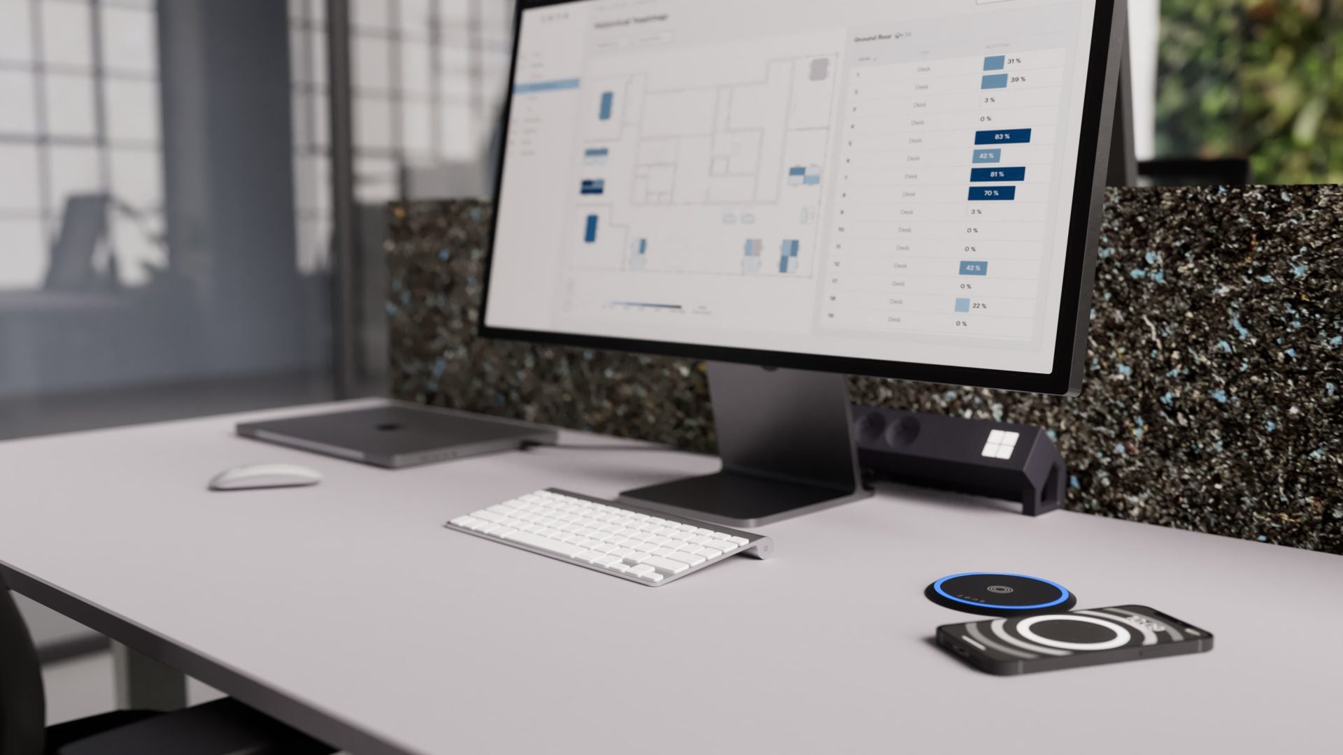 Zens DMS PuK visual dashboard with wireless and magnetic charging in an office setting.