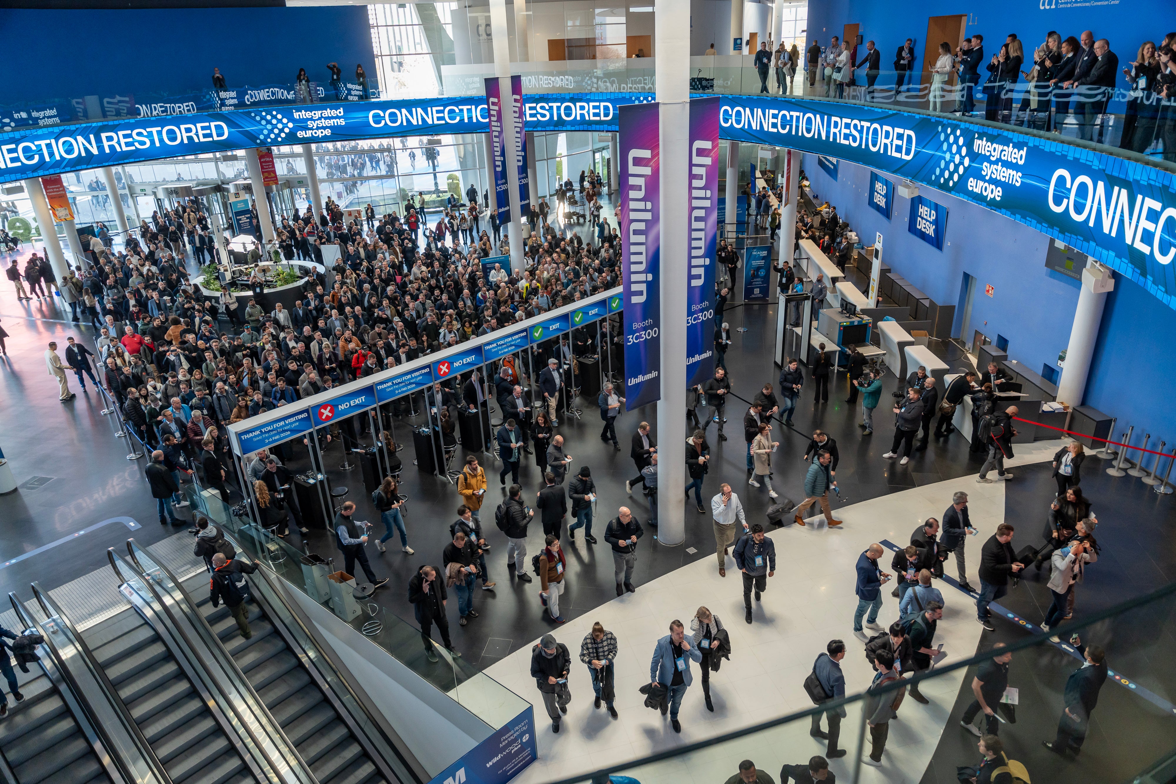Zens exhibition booth at ISE 2025 in Barcelona showcasing wireless charging solutions.